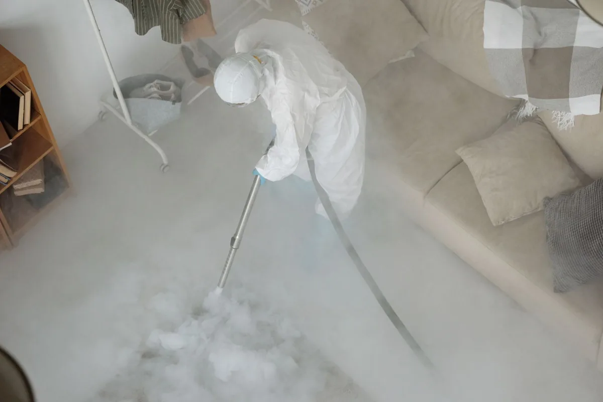 Biohazard cleanup technician in protective equipment, Surf City, NJ